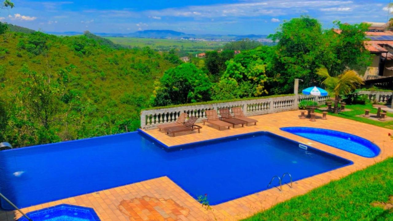 Pousada Nossa Senhora Penedo  Buitenkant foto View of the swimming pool at the hotel