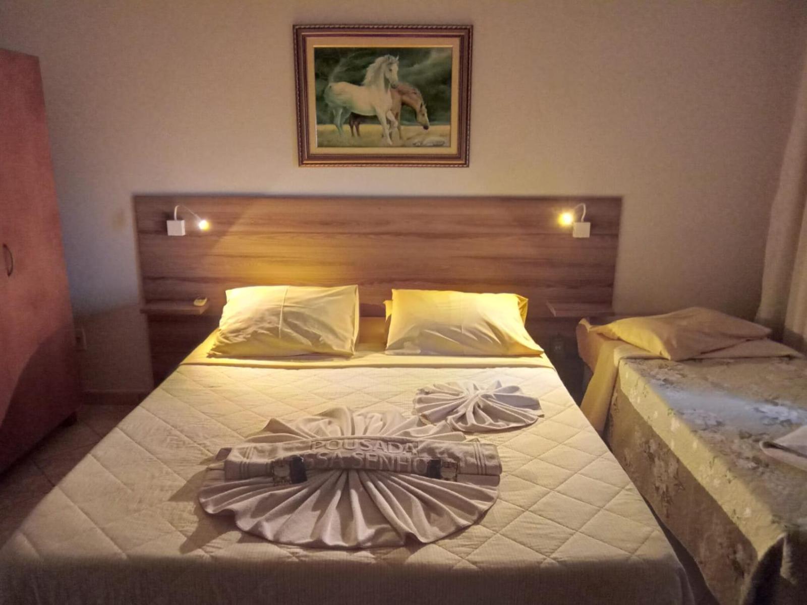 Pousada Nossa Senhora Penedo  Buitenkant foto A bedroom in a hotel