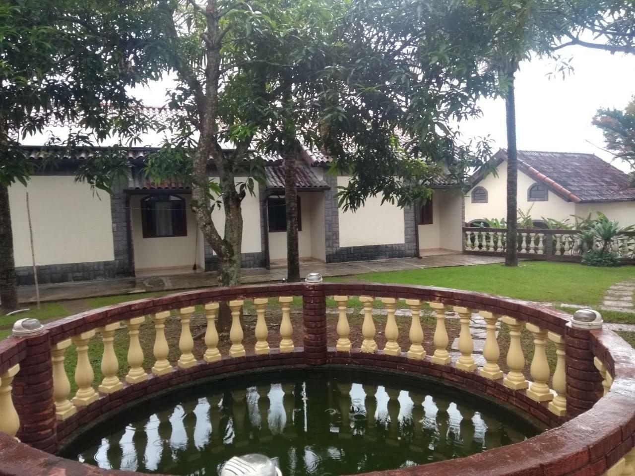 Pousada Nossa Senhora Penedo  Buitenkant foto The fountain at the front of the house